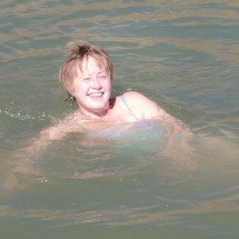 Marion enjoying the warm water of the Laguna Tarapaya
